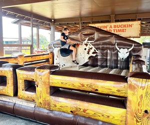 Cowboy Adventure Park at Westgate River Ranch Resort & Rodeo treats visitors to fun attractions, including the mechanical bull! Photo by author