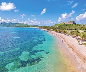 Beach, volcano, chocolate, water sports, hiking, horseback, amazing food, incredible people... why St. Lucia should be your next family vacation. Photo courtesy of Coconut Bay Beach Resort & Spa