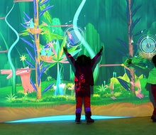 Kid can immerse themselves in the Connected Worlds Exhibit at the New York Hall of Science. Photo by David Handschuh