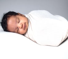 Have sweet dreams of all the free baby stuff you'll get. Photo by Garrett Jackson courtesy of Unsplash