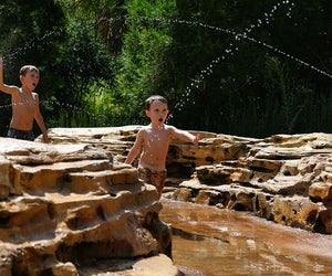 Splash around in the water feature at Bok Tower's Hammock Hollow Children's Garden. Photo courtesy of Bok Tower Gardens