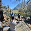 Take a break along the Merced River as you hike along the Valley Loop Trail in Yosemite National Park. 